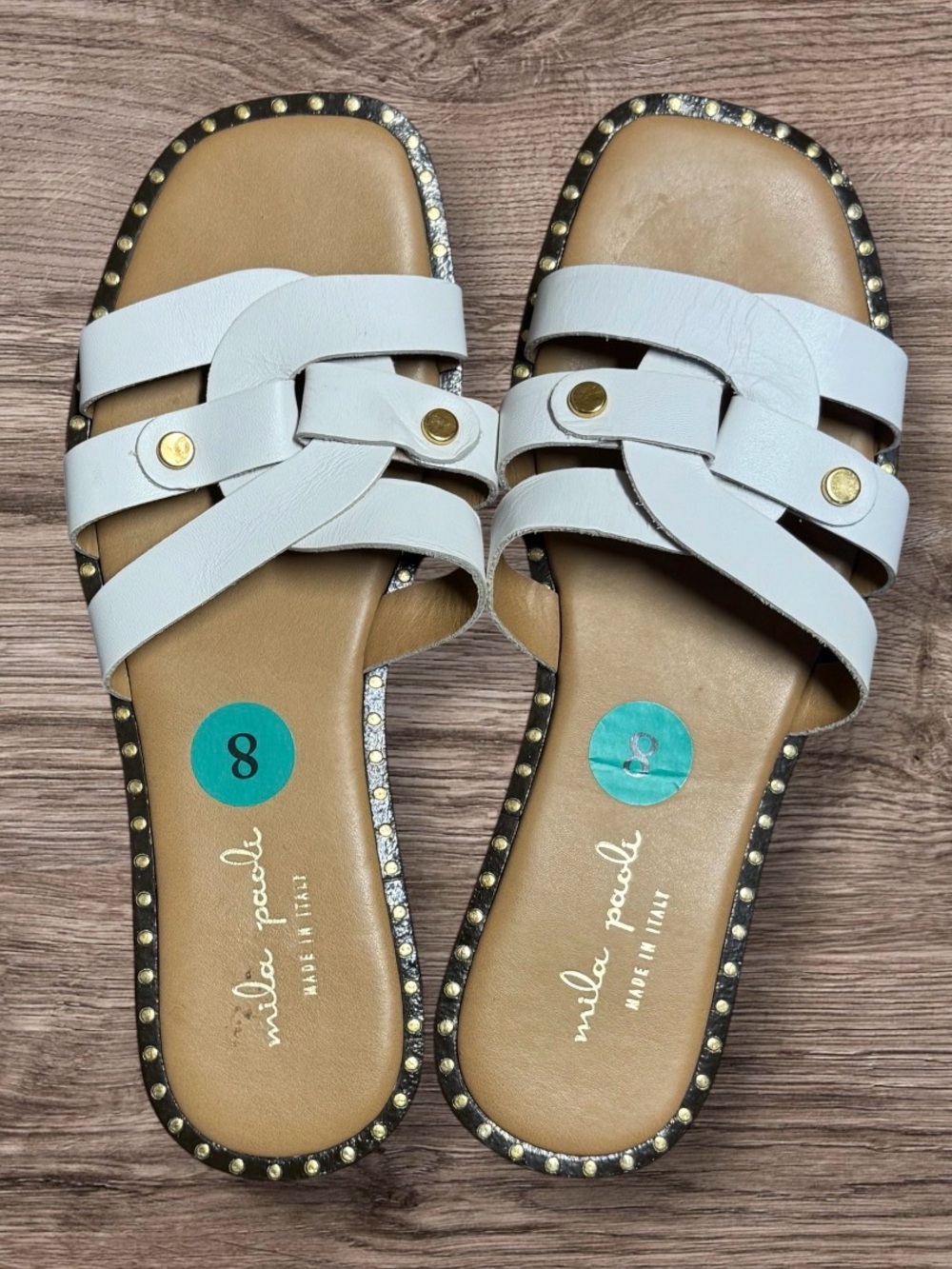 EUC Mila Paoli white leather slide sandals feature a woven crisscross strap